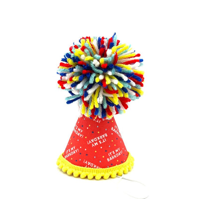 red, yellow, and fluffy tip party hat